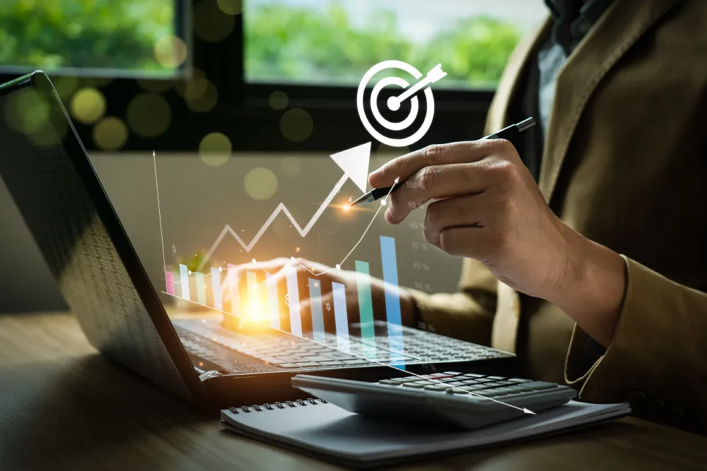 Business goals and marketing strategies. Businessman calculating business growth with arrow graph icon on laptop. economic, development, success, strategy, prospects, sustainable goals.