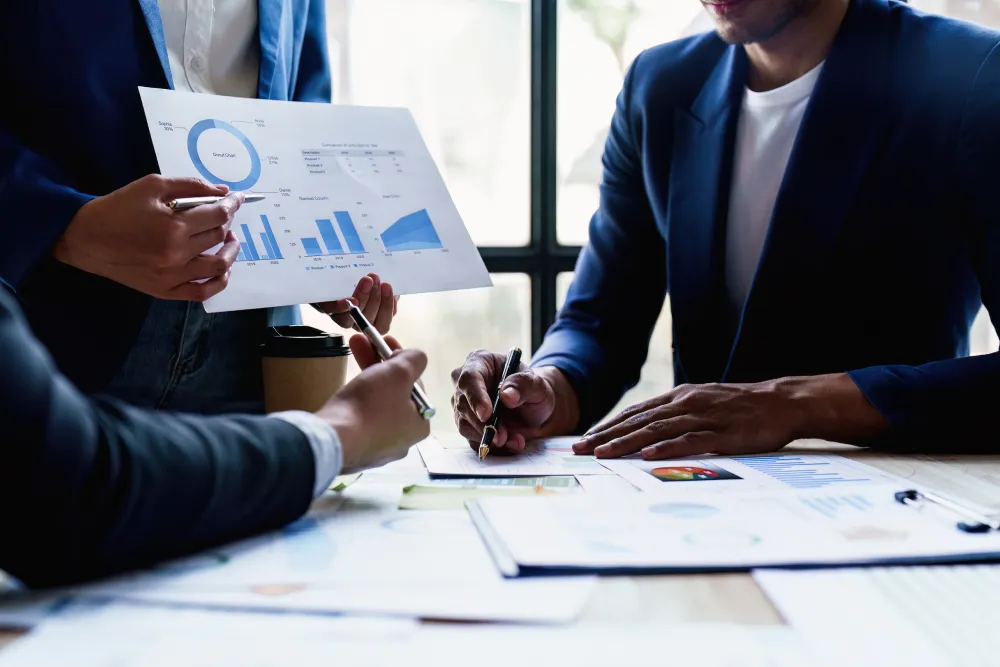 Close up Business team of financial analyze about companys graph profit. finance, strategy, meeting concept